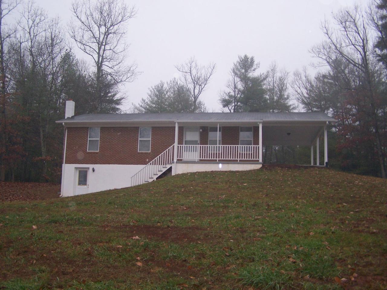 530 Isolane Road Callaway, VA 24067 - Photo 1 of 1 a front view of house with yard and green space