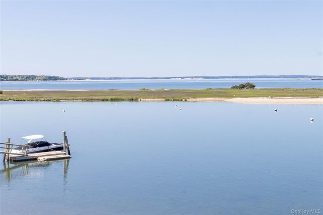 a view of a lake with a mountain