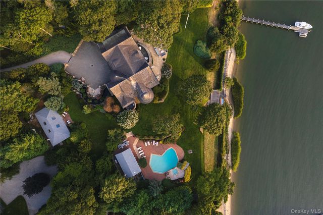 a view of swimming pool from a lake view
