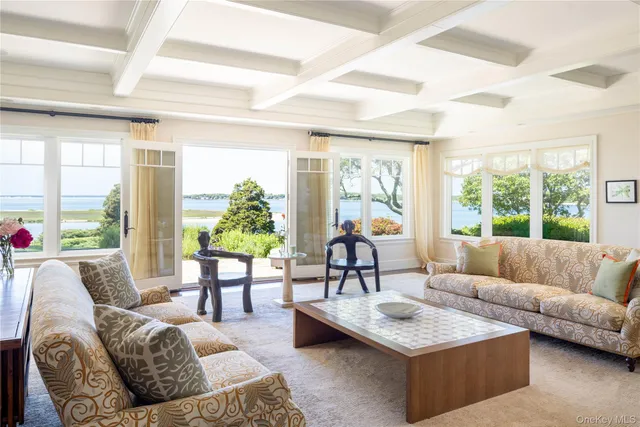 a view of a garden with lawn chairs