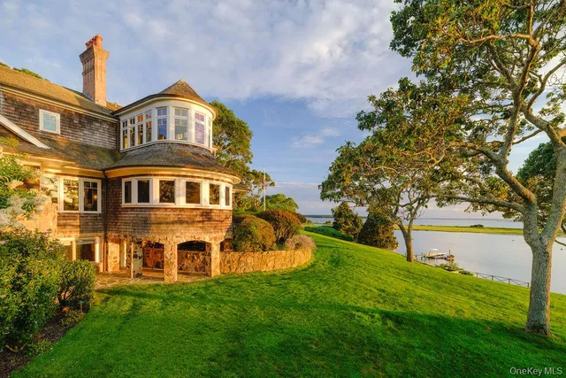 a view of a lake with a big yard