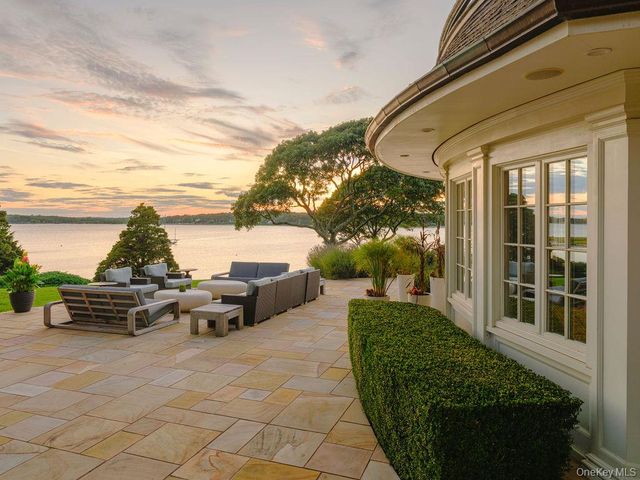 a view of a lake with a big yard