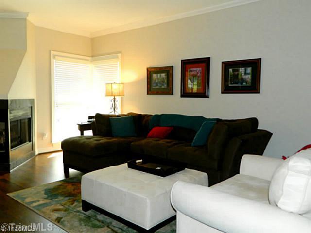 2314 Addison Boulevard High Point, NC 27262 - Photo 4 of 16 Living Room. Living room has lots of space and pass through fireplace