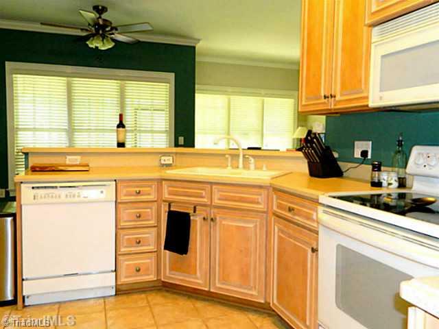 2314 Addison Boulevard High Point, NC 27262 - Photo 10 of 16 Kitchen. Open Kitchen has eat in bar, that flows into breakfast area