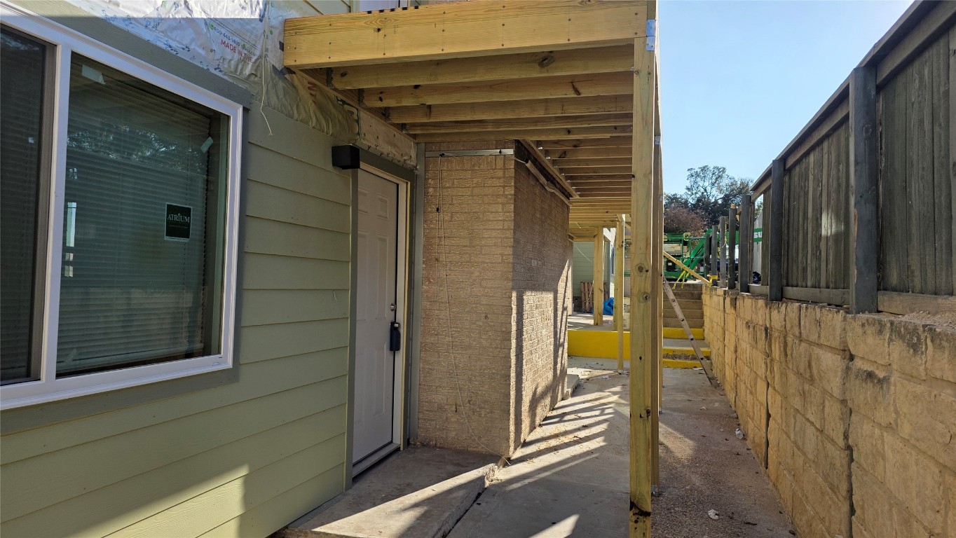 2124 Burton Drive, Unit 152 Austin, TX 78741 - Photo 16 of 16 a view of balcony door and porch