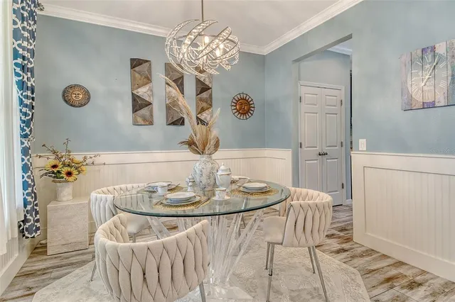 a view of kitchen with cabinets and wooden floor