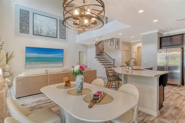 a bathroom with a granite countertop sink toilet and a mirror