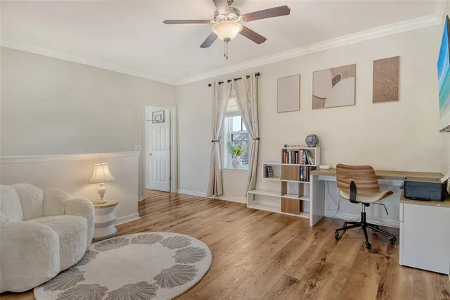 a view of a house with backyard porch and sitting area