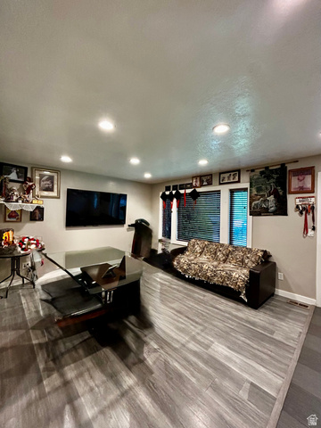 1931 Harrison Boulevard Ogden, UT 84401 - Photo 3 of 21 Spacious living area, recessed lighting, and large windows with blinds