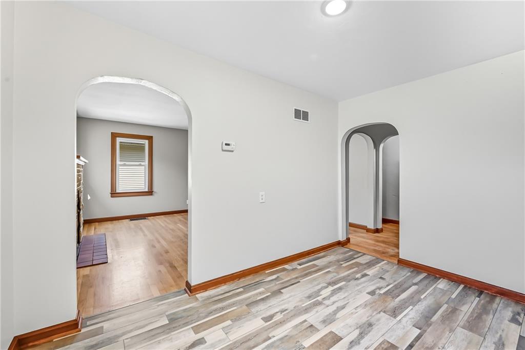 609 Park Avenue Farrell, PA 16121 - Photo 12 of 49 a view of a room with wooden floor and cabinet