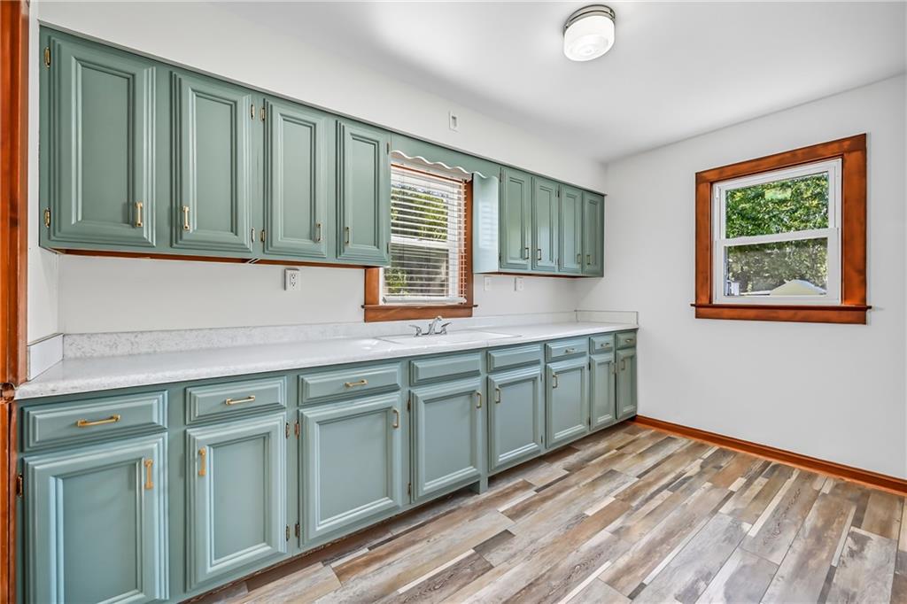 609 Park Avenue Farrell, PA 16121 - Photo 17 of 49 a kitchen with a sink cabinets and window