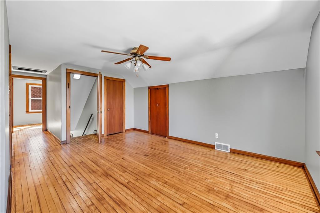 609 Park Avenue Farrell, PA 16121 - Photo 30 of 49 a view of empty room with wooden floor and fan