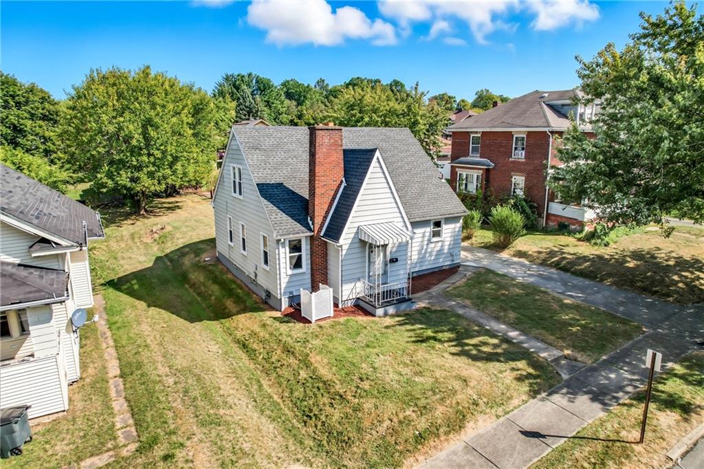 609 Park Avenue Farrell, PA 16121 - Photo 3 of 49 a front view of a house with a yard