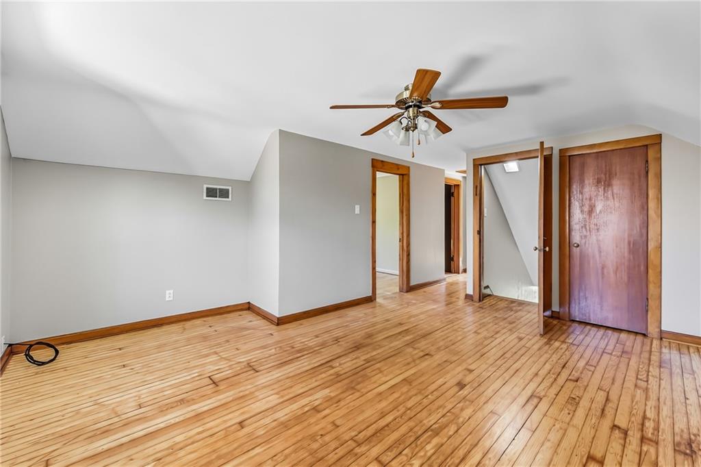 609 Park Avenue Farrell, PA 16121 - Photo 31 of 49 a view of room with wooden floor and ceiling fan