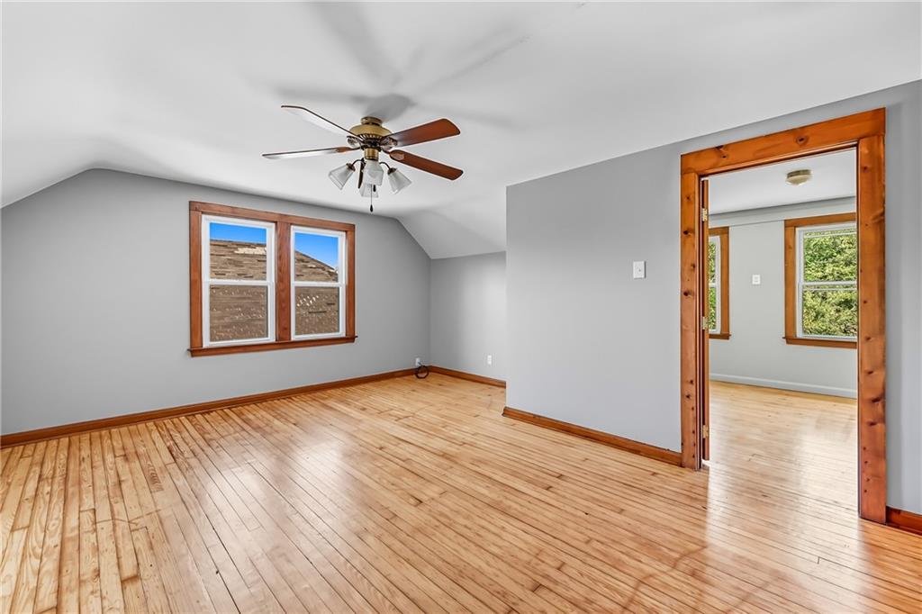 609 Park Avenue Farrell, PA 16121 - Photo 32 of 49 a view of empty room with wooden floor and fan