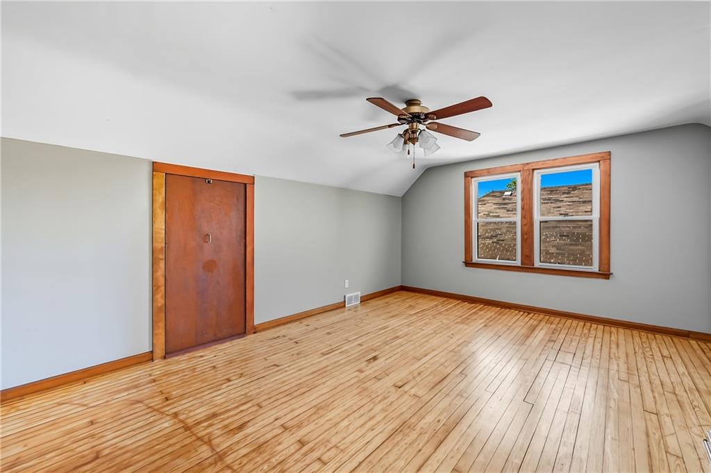 609 Park Avenue Farrell, PA 16121 - Photo 34 of 49 a view of empty room with wooden floor and fan