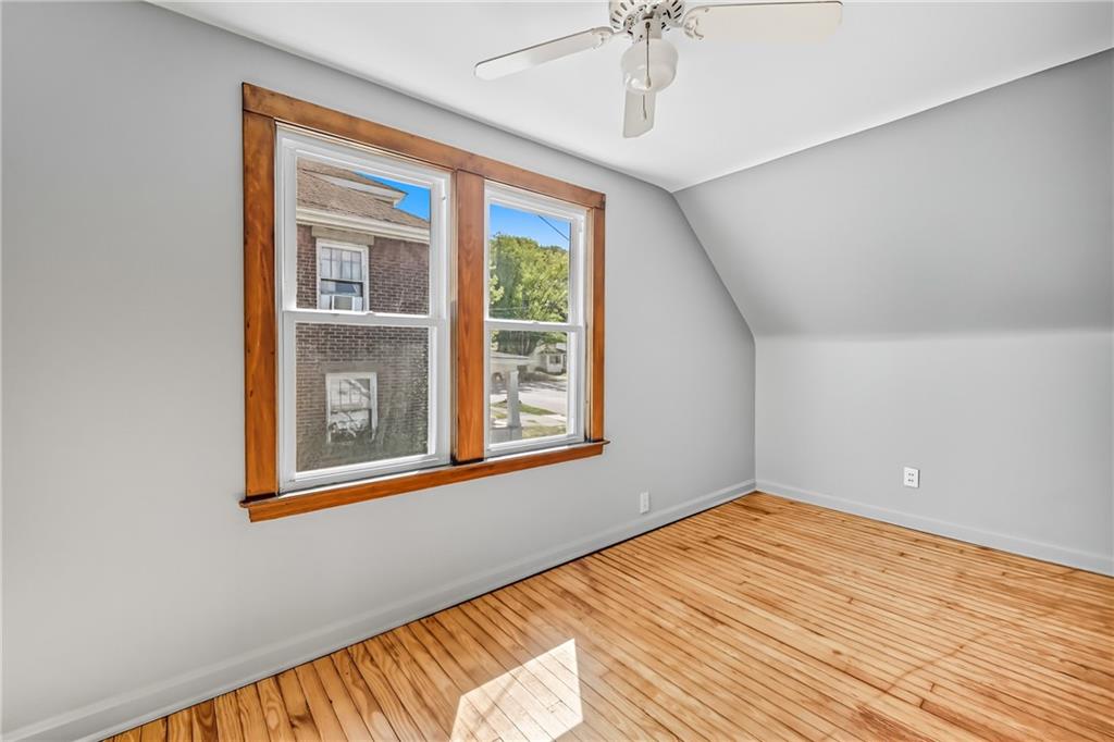 609 Park Avenue Farrell, PA 16121 - Photo 40 of 49 a view of a room with wooden floor and chandelier