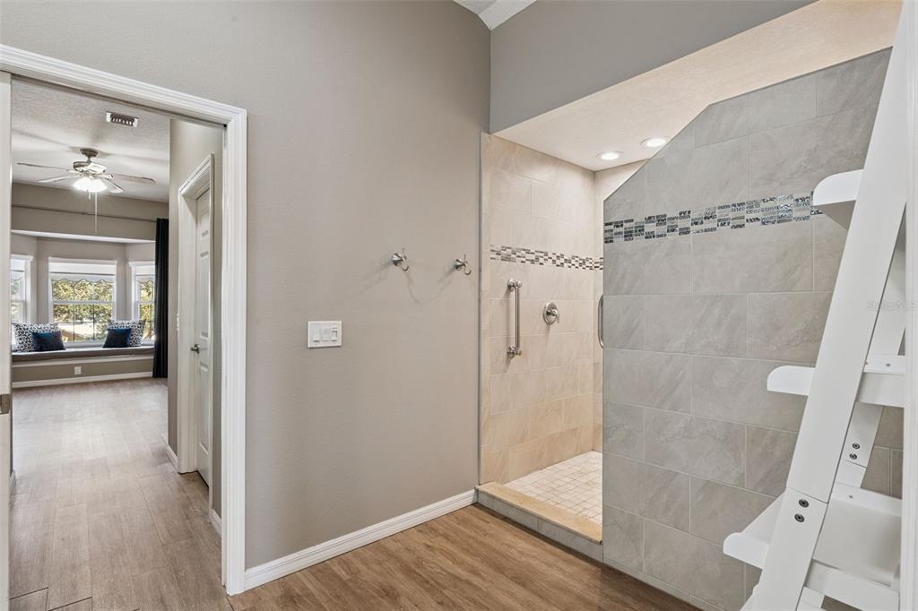 261 Mill Slough Road Oviedo, FL 32766 - Photo 38 of 62 a view of a bathroom from the hallway