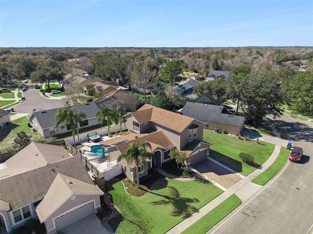 261 Mill Slough Road Oviedo, FL 32766 - Photo 56 of 62 an aerial view of a house with a garden