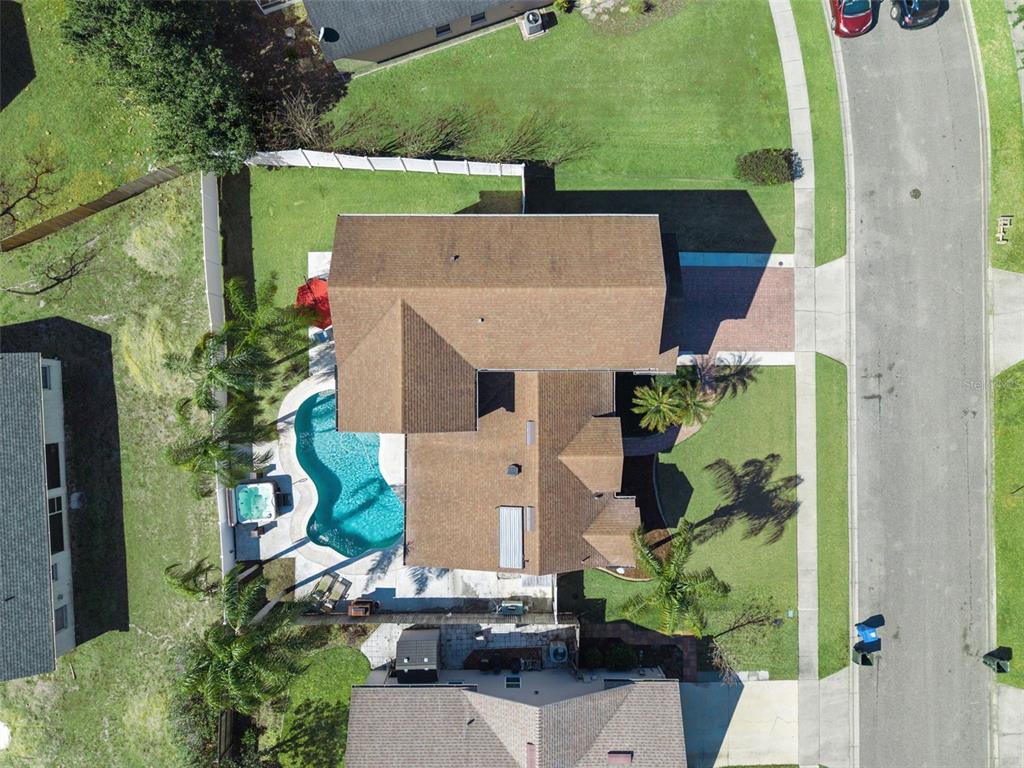 261 Mill Slough Road Oviedo, FL 32766 - Photo 60 of 62 an aerial view of a house with a yard