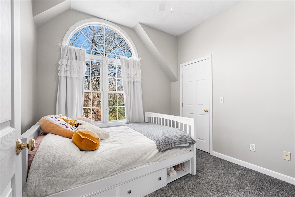 52 Deanville Road Attleboro, MA 02703 - Photo 15 of 30 a bedroom with a bed and window