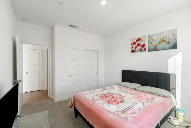 a bathroom with a bathtub a toilet and a shower