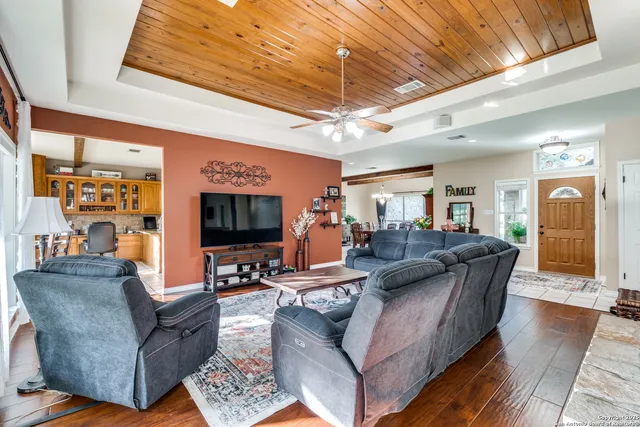 a living room with furniture and a table