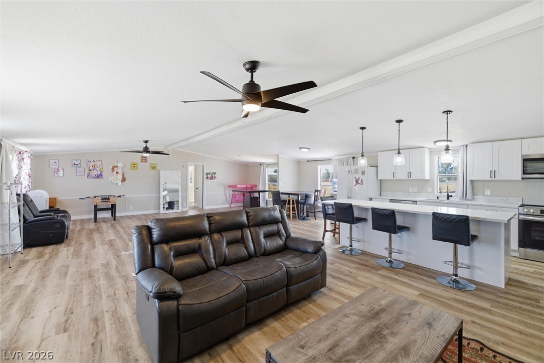 4331 Retread Road Pahrump, NV 89048 - Photo 30 of 31 An open floorplan seamlessly connects the well-lit living area with a contemporary kitchen.