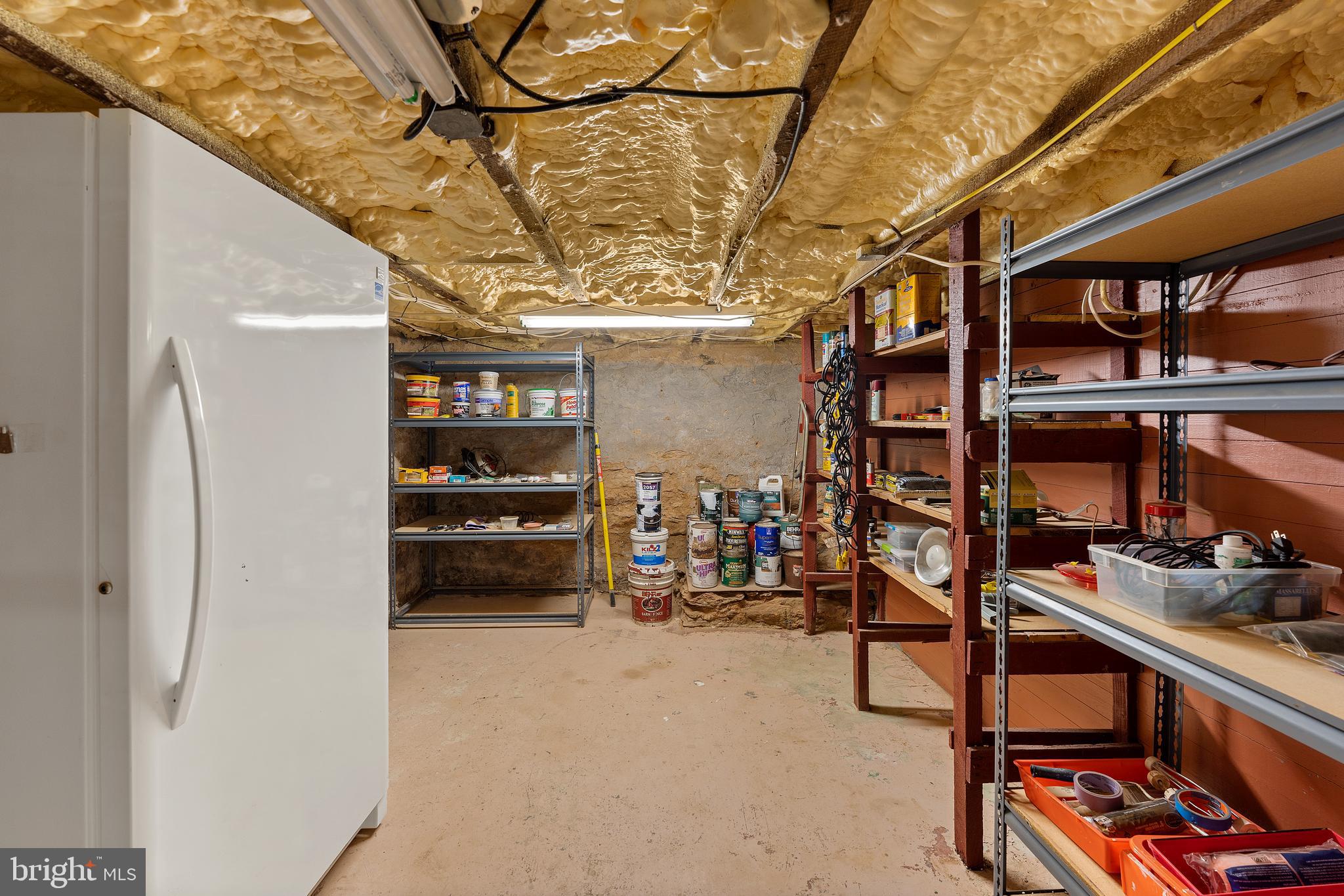 3225 Orwig Road Stewartstown, PA 17363 - Photo 61 of 79 Built-in shelving, freezer conveys