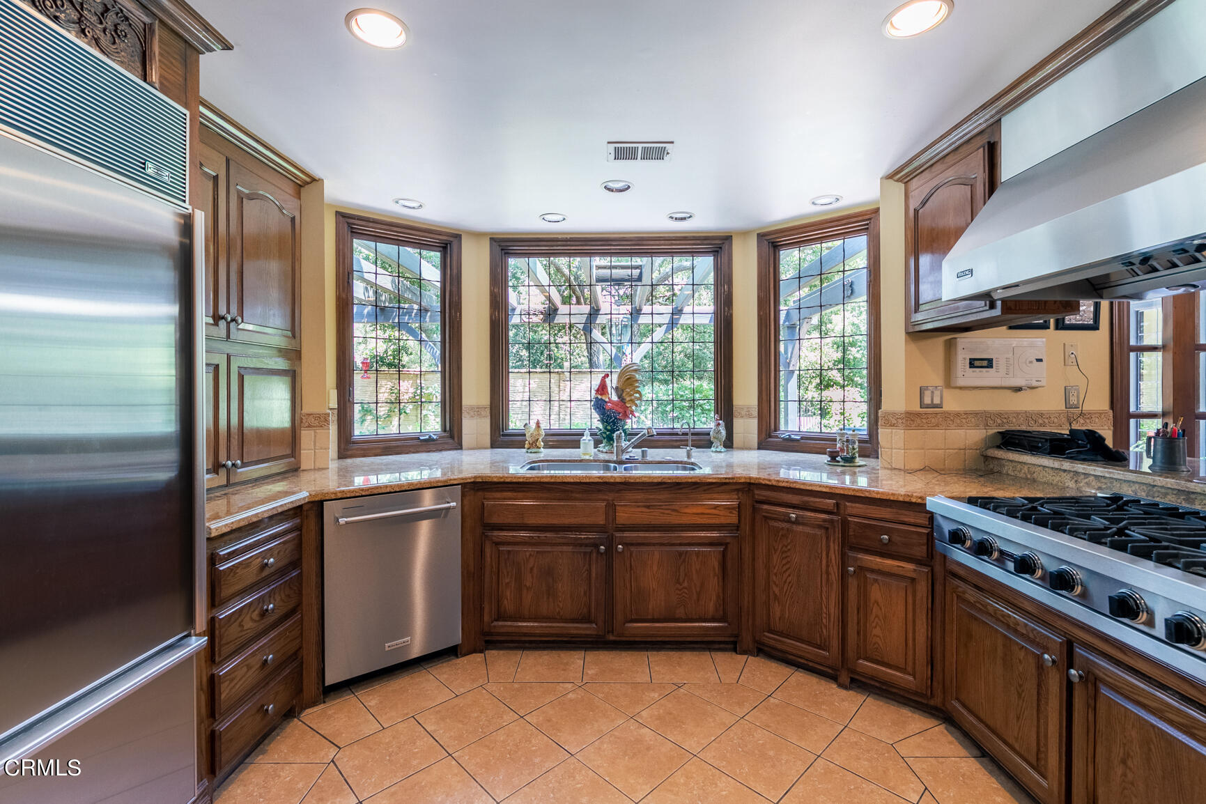 930 Ellington Lane Pasadena, CA 91105 - Photo 24 of 65 a kitchen with stainless steel appliances granite countertop a sink and stove