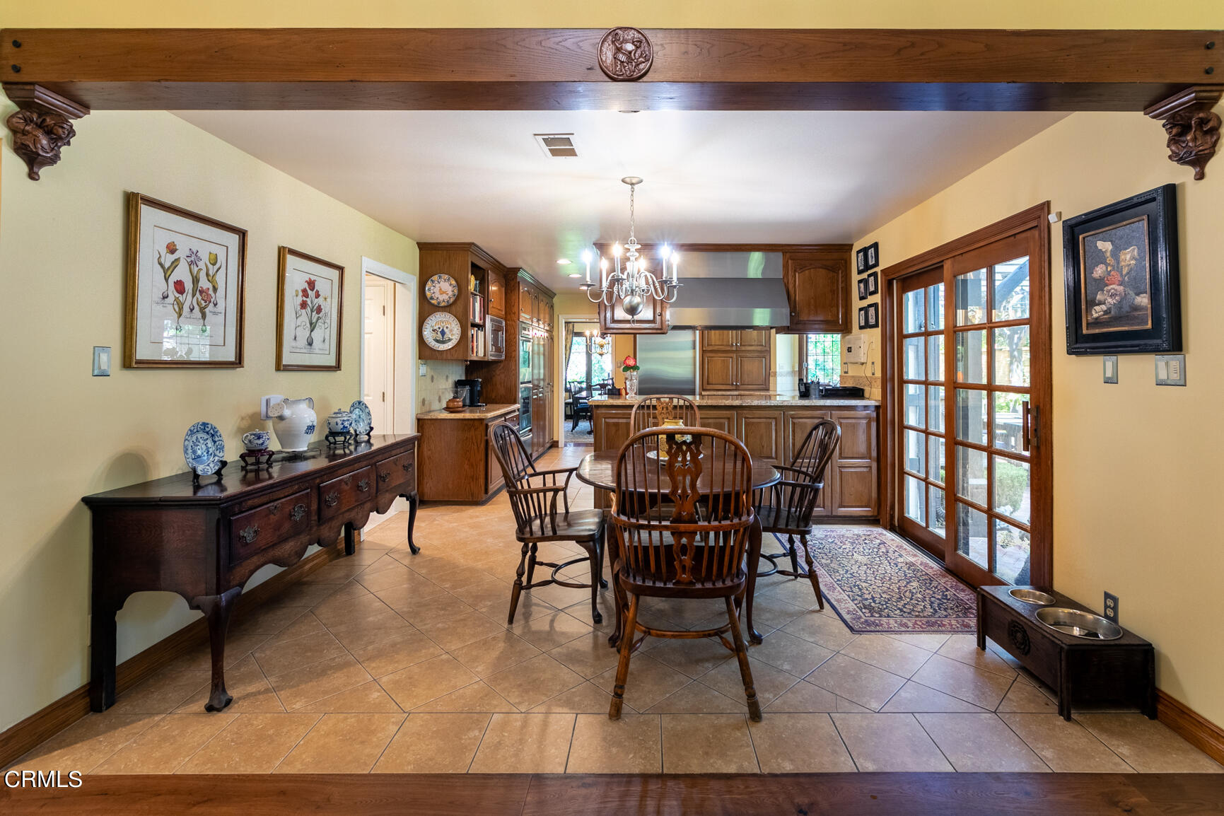930 Ellington Lane Pasadena, CA 91105 - Photo 28 of 65 a dining room with wooden floor and furniture