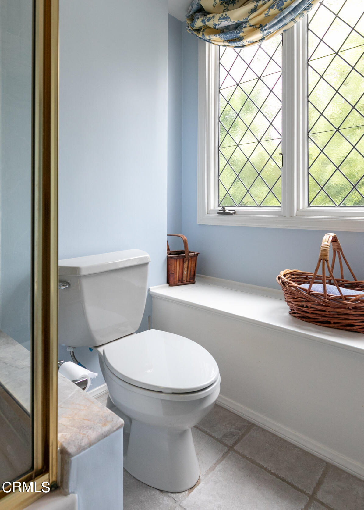 930 Ellington Lane Pasadena, CA 91105 - Photo 44 of 65 a bathroom with a toilet a sink and a window