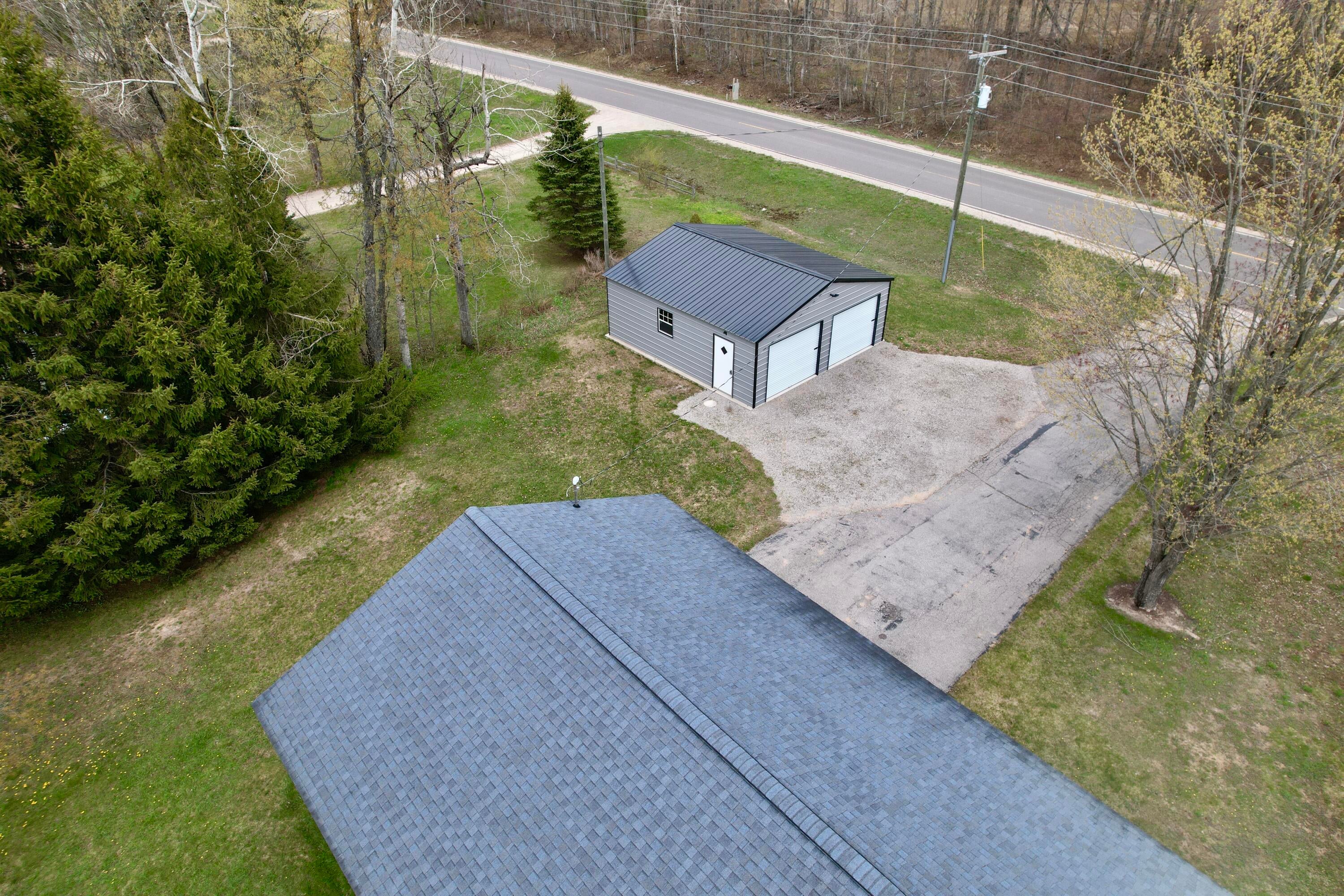 2424 Hallock Road Gaylord, MI 49735 - Photo 28 of 43 dji_fly_20260510_140724_560_177843660871