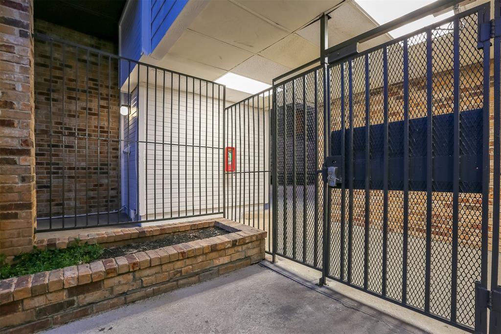 912 West 22nd Street, Unit 106 Austin, TX 78705 - Photo 8 of 11 a view of outdoor space with wooden fence
