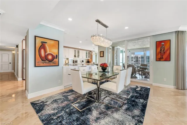 a view of a living room and dining room