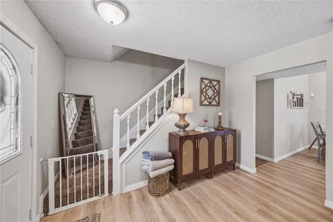 a view of living room with furniture and a window