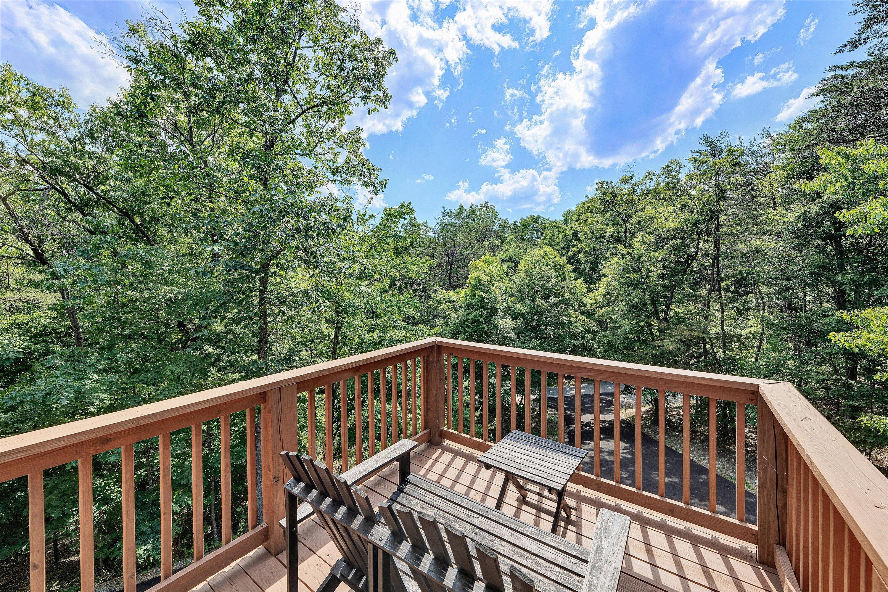 6211 Hillcrest Road Salem, VA 24153 - Photo 20 of 36 a view of balcony with deck and trees
