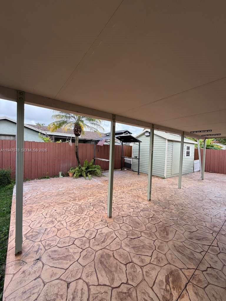 12241 Southwest 268th Street, Unit 1 Homestead, FL 33032 - Photo 16 of 25 a view of a backyard