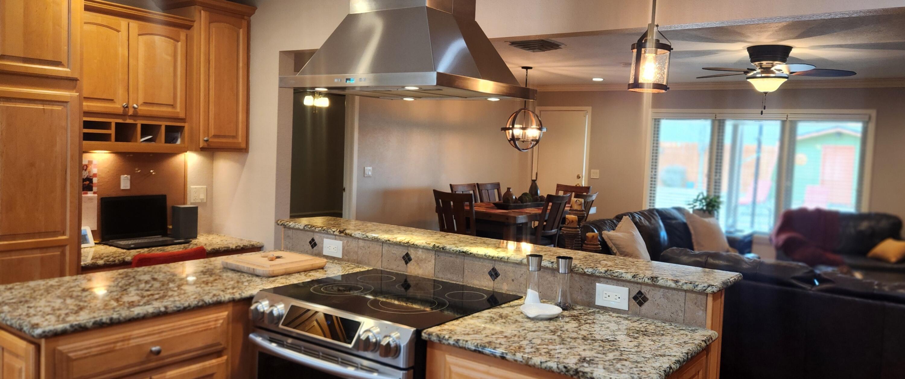 314 West Ave J Muleshoe, TX 79347 - Photo 14 of 40 a kitchen with a stove and a sink
