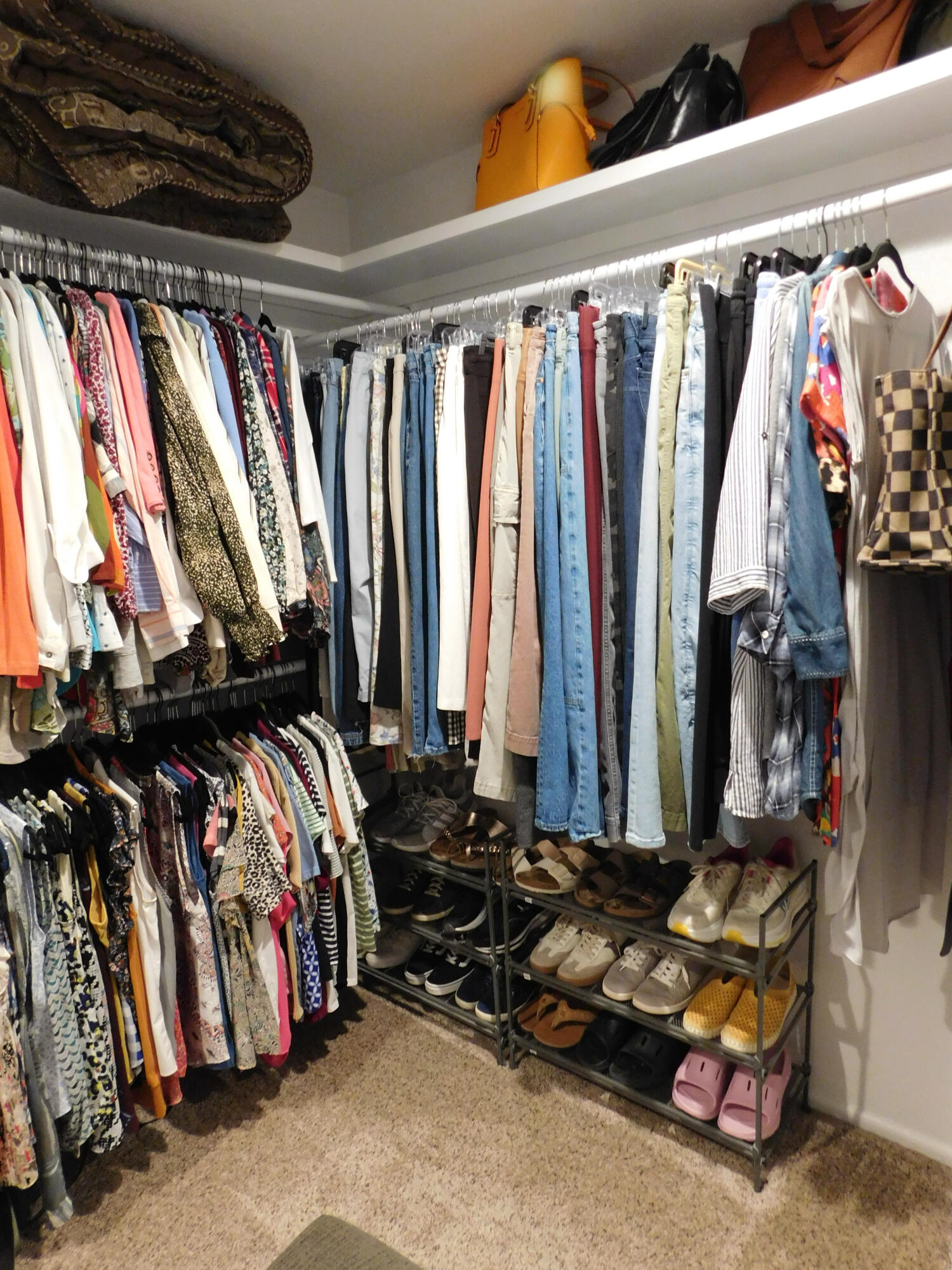 314 West Ave J Muleshoe, TX 79347 - Photo 20 of 40 a view of walk in closet with clothes