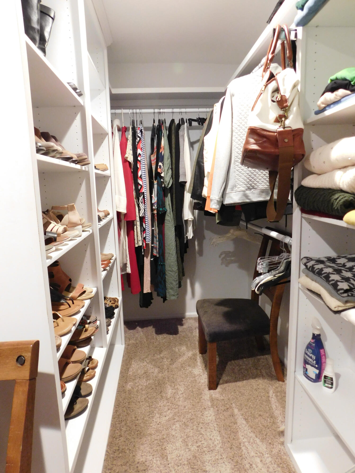 314 West Ave J Muleshoe, TX 79347 - Photo 22 of 40 a walk in closet with clothes and shoes