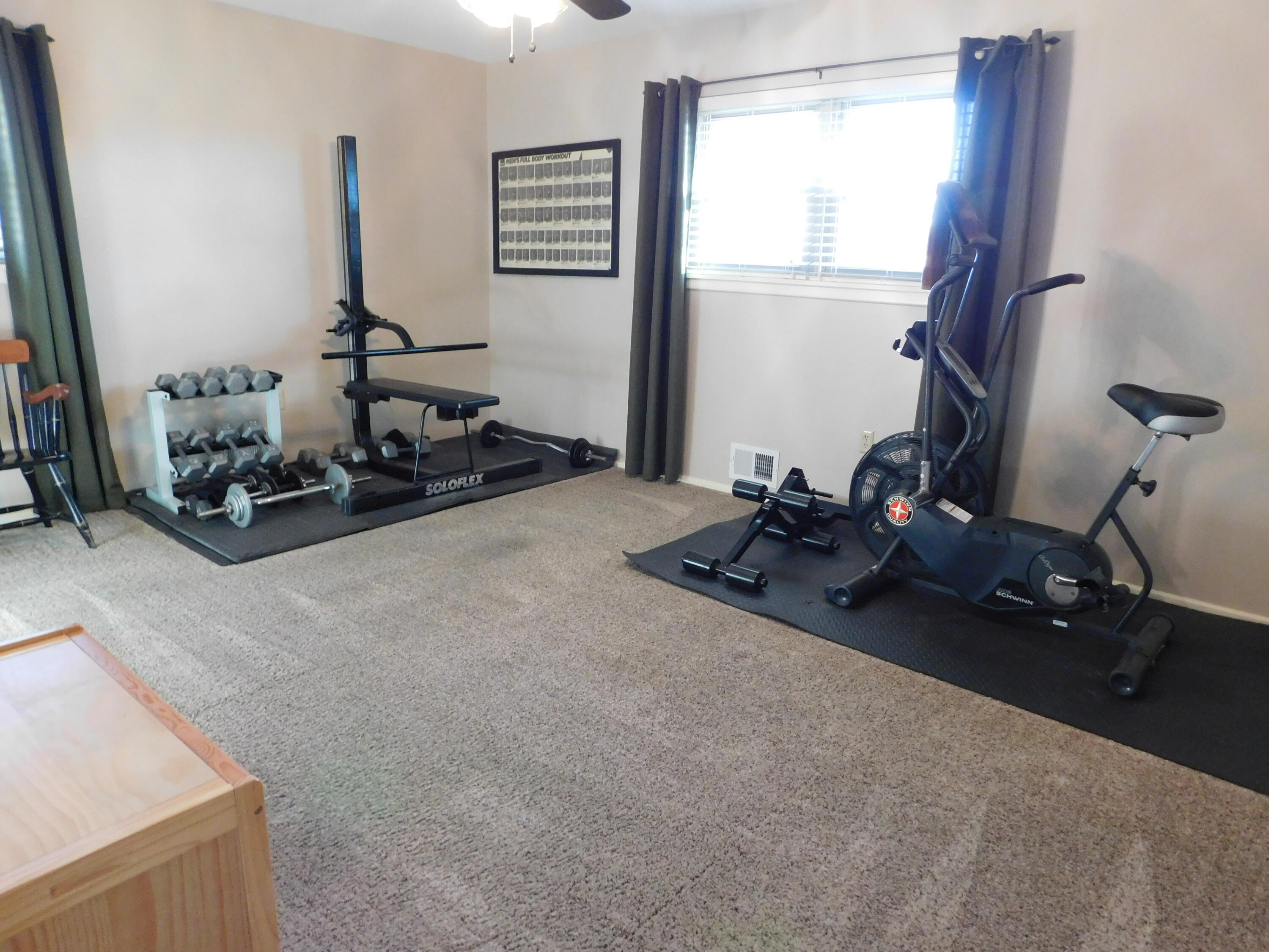 314 West Ave J Muleshoe, TX 79347 - Photo 23 of 40 a room with gym equipment