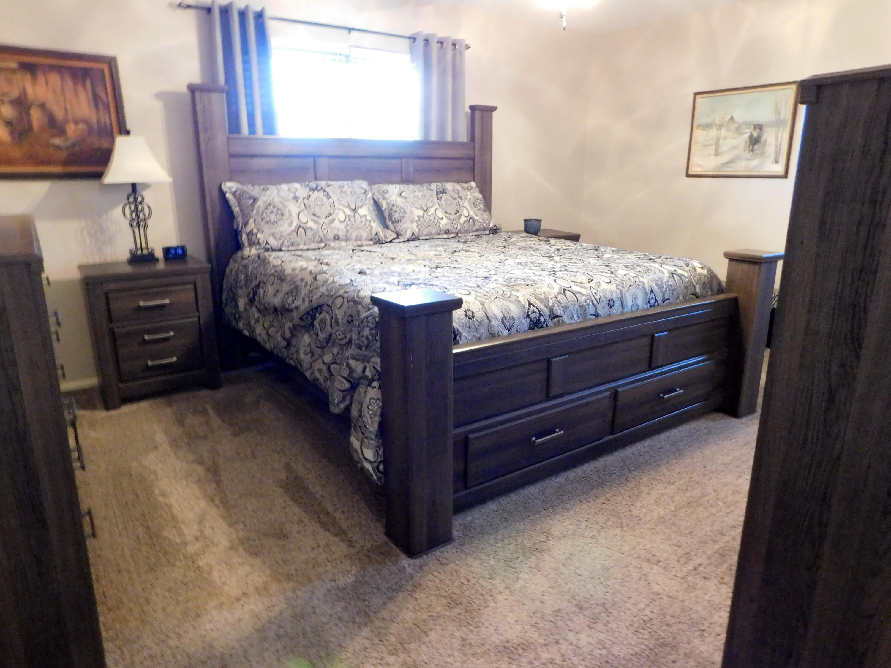 314 West Ave J Muleshoe, TX 79347 - Photo 28 of 40 a bed sitting in a bedroom next to a window