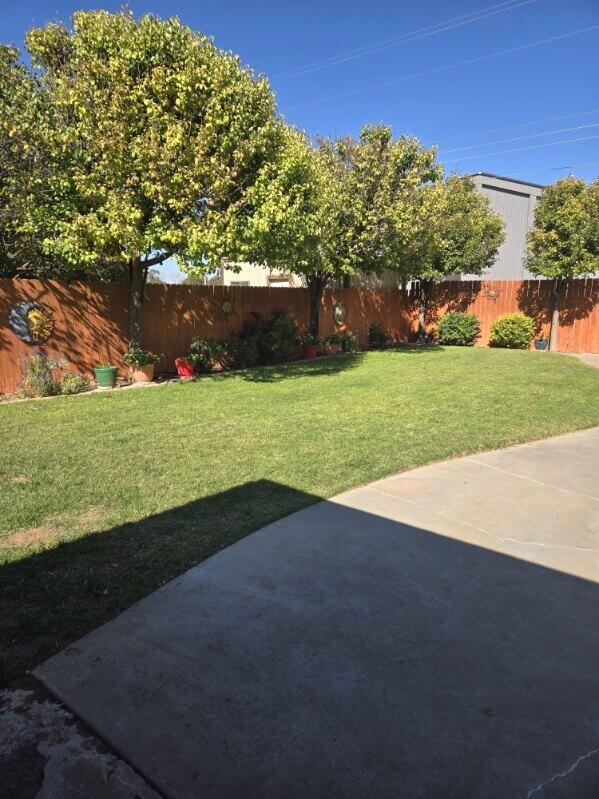 314 West Ave J Muleshoe, TX 79347 - Photo 32 of 40 a view of an outdoor space and a yard