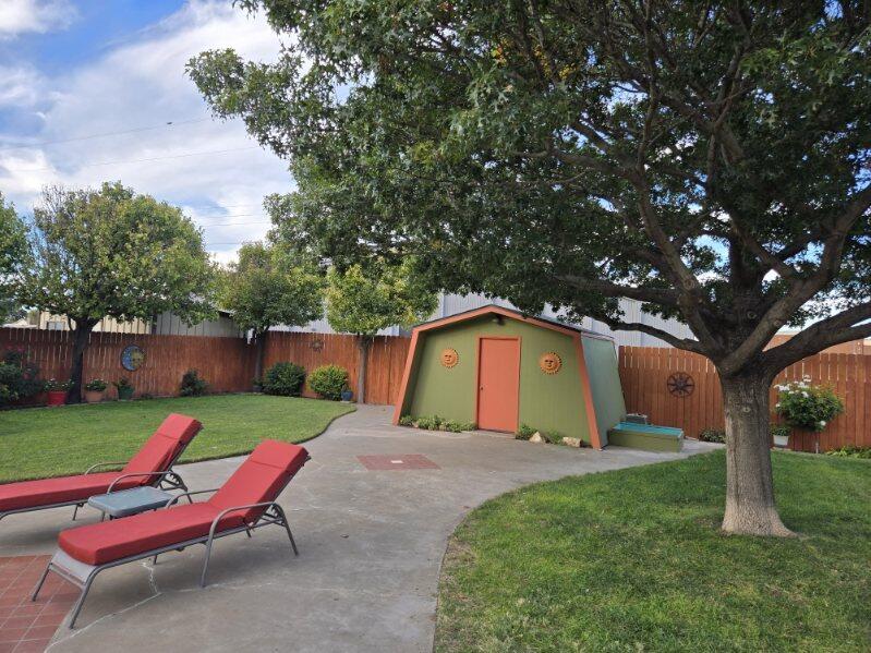 314 West Ave J Muleshoe, TX 79347 - Photo 36 of 40 a view of backyard with outdoor seating and green space