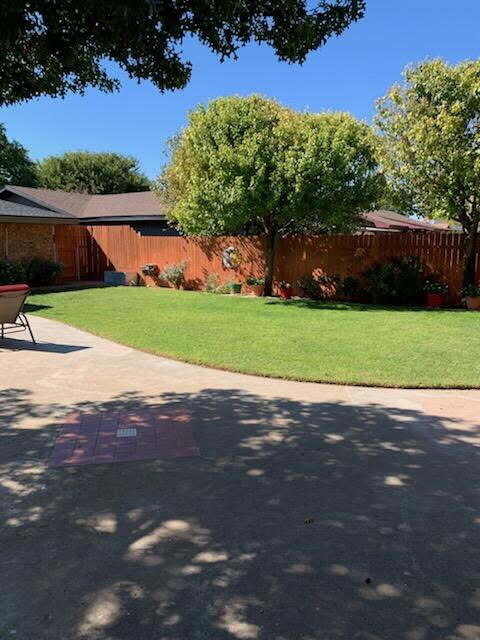 314 West Ave J Muleshoe, TX 79347 - Photo 39 of 40 a view of a street with a big yard