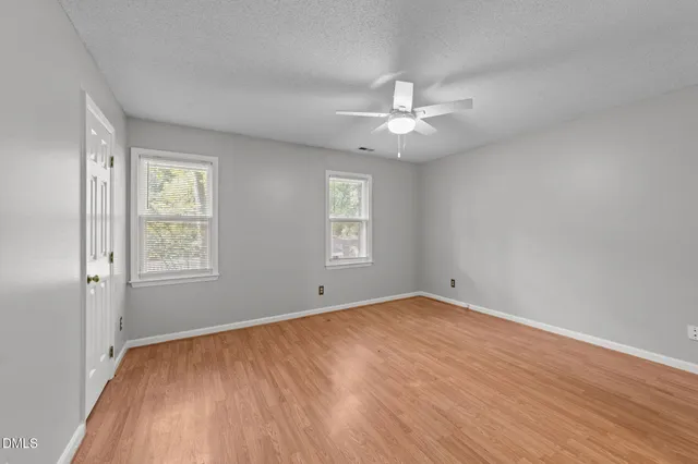 a view of a wooden fence