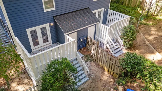 a kitchen with granite countertop a sink stainless steel appliances and cabinets