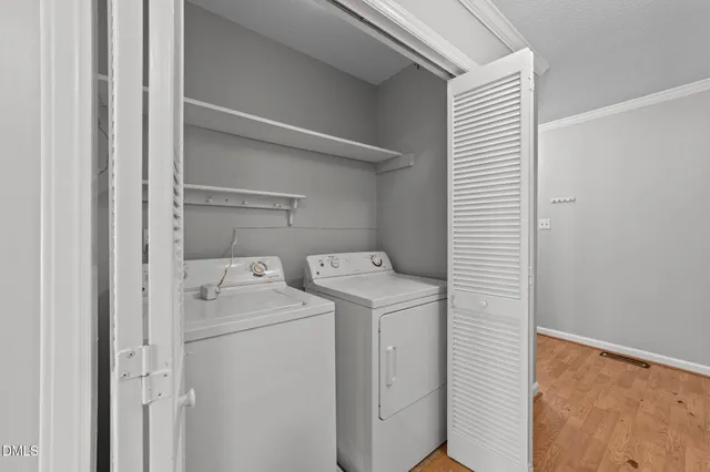 a bathroom with a sink toilet and vanity