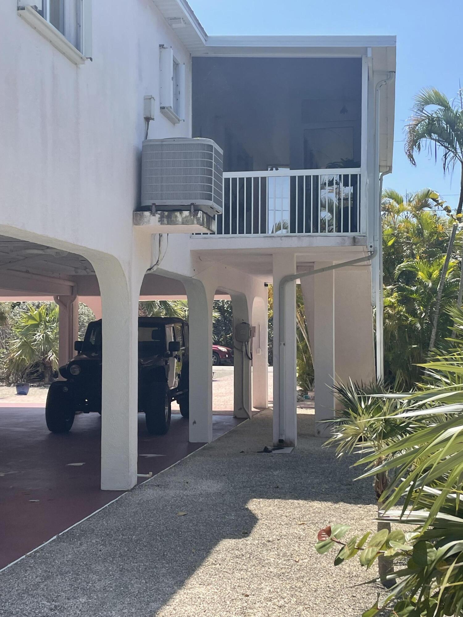 Undisclosed Address Big Pine Key, FL 33043 - Photo 20 of 28 a view of a hallway with seating area